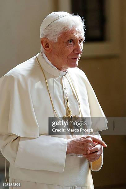 Pope Benedict XVI visits the main altar of the Dom cathedral on September 23, 2011 in Erfurt, Germany. The Pope is in Erfurt on the second of a...