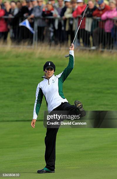 Azahara Munoz of Europe reacts to a putt on the 16th green during the morning foursomes on day one of the 2011 Solheim Cup at Killeen Castle Golf...