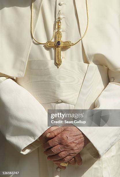 Pope Benedict XVI, poses for a group photo with Catholic clergy and other people after leading an ecumenical devotion at Augustinerkloster abbey on...