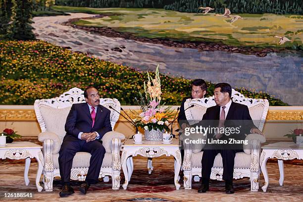 Mauritanian President Mohamed Ould Abdel Aziz speaks during the meeting with Jia Qinglin , Chairman of the Chinese People's Political Consultative...