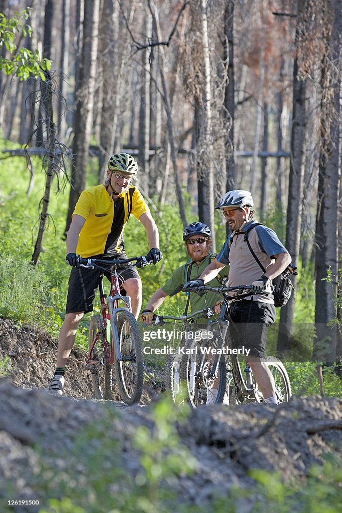 Men resting from mt biking