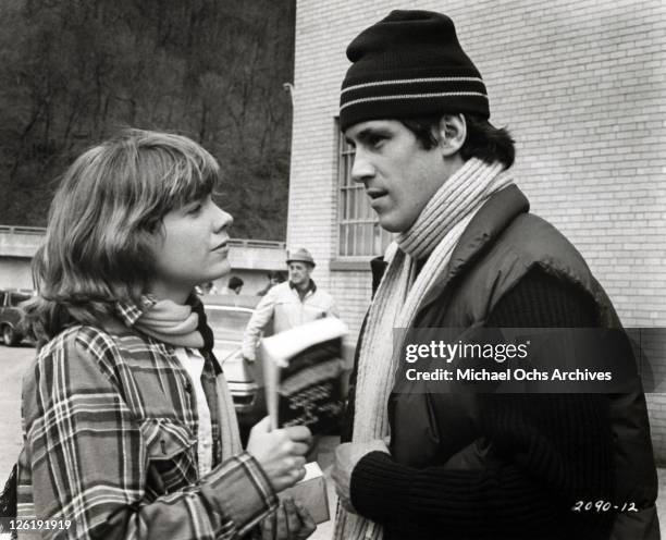 Lily Braden and Ned Braden play constantly sparring spouses during the movie "Slap Shot" in 1977.