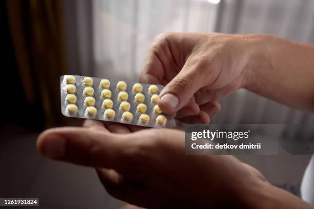 hands with medicines close up. medicine and details - blister stock pictures, royalty-free photos & images