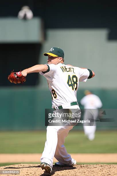 Michael Wuertz of the Oakland Athletics pitches during the game against the Kansas City Royals at the Oakland-Alameda County Coliseum on September 5,...