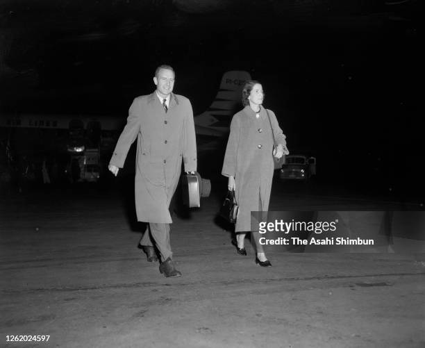 John D. Rockefeller III and his wife Blanchette are seen on arrival at Haneda Airport on February 19, 1954 in Tokyo, Japan.