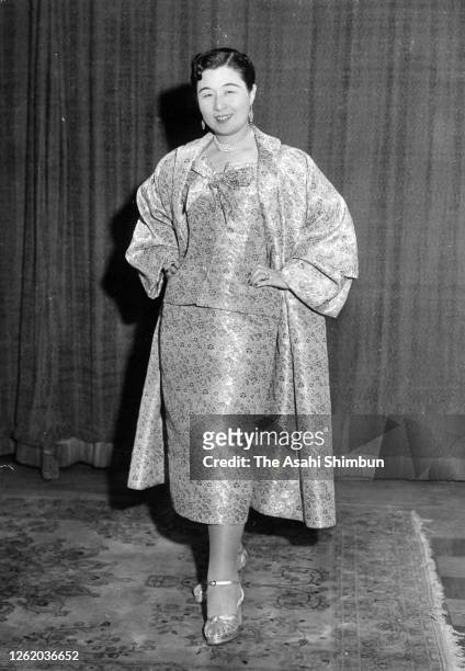 Princess Kikuko of Takamatsu poses with wearing a gown presented from Christian Dior on December 14, 1954 in Tokyo, Japan.