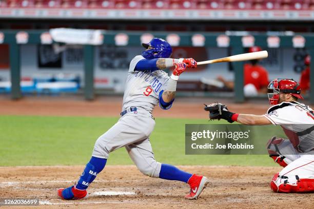 Javier Baez of the Chicago Cubs hits a solo home run in the seventh inning of the game against the Cincinnati Reds at Great American Ball Park on...