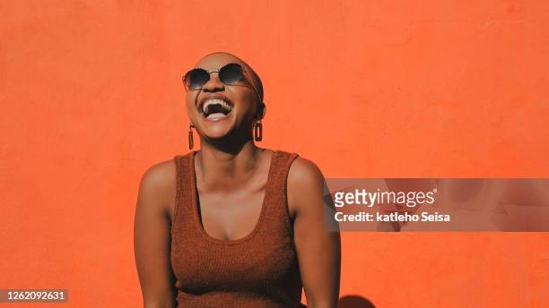 living that laugh a minute life - fashion orange colour stock pictures, royalty-free photos & images