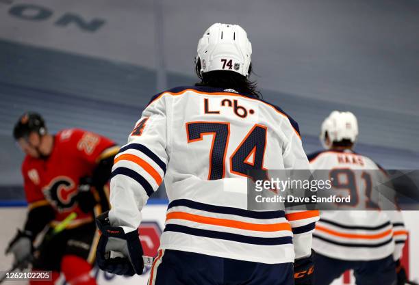 Ethan Bear of the Edmonton Oilers wears a special jersey as he warms up before the exhibition game against the Calgary Flames prior to the 2020 NHL...