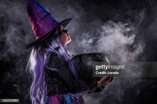 halloween witch girl - wizard stock pictures, royalty-free photos & images