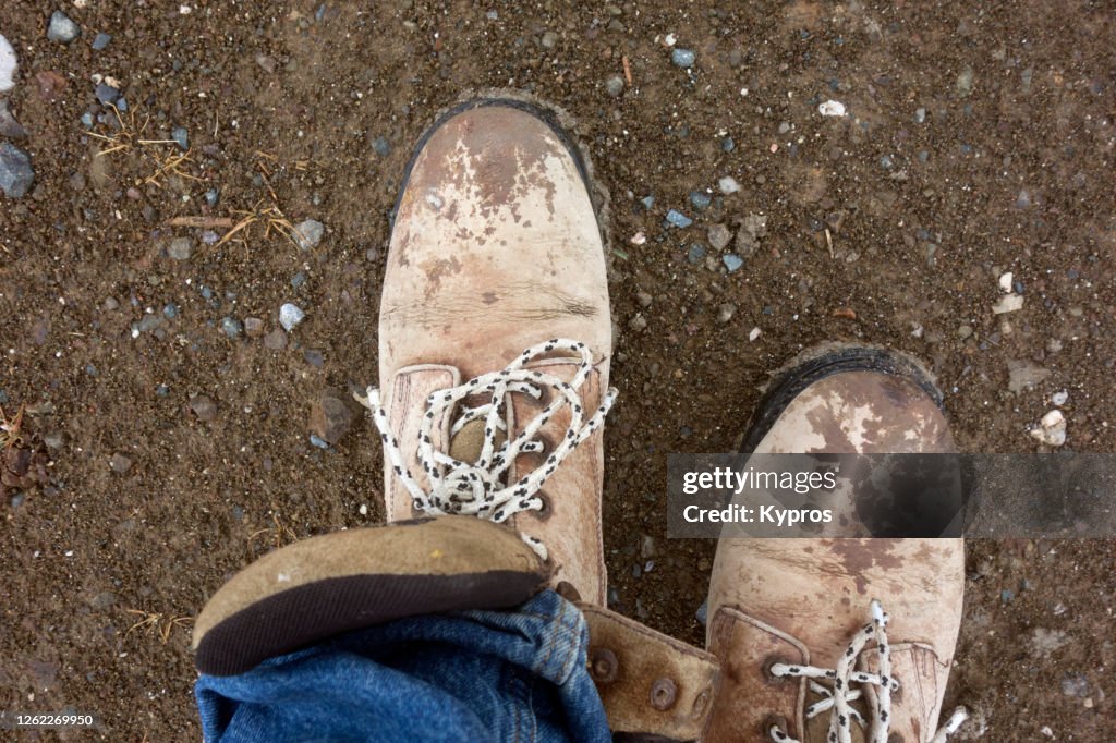 Greece - Man Wearing Leather Boots And Jeans
