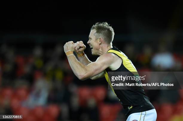Jack Riewoldt of the Tigers celebrates kicking a goal during the round nine AFL match between the Western Bulldogs and the Richmond Tigers at...