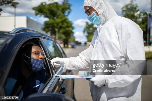 diver through covid-19 testing - lockdown stock pictures, royalty-free photos & images