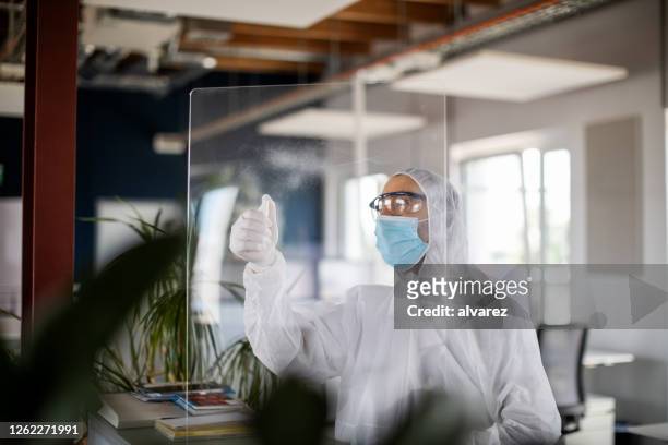 worker sanitizing the office - office cleaning stock pictures, royalty-free photos & images