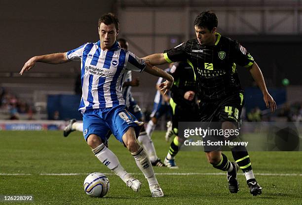 Ashley Barnes of Brighton evades Darren O'Dea of Leeds during the npower Championship match between Brighton and Hove Albion and Leeds United at Amex...