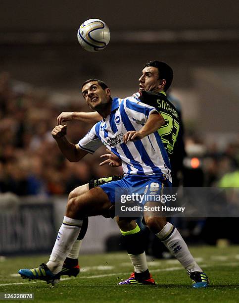 Gary Dicker of Brighton in action with Robert Snodgrass of Leeds during the npower Championship match between Brighton and Hove Albion and Leeds...