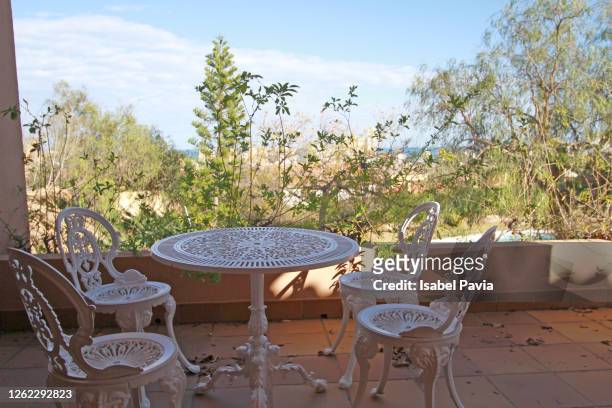 white terrace at private garden - private terrace balcony stock-fotos und bilder