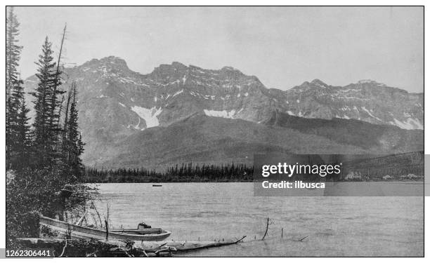 antique black and white photo: banff, canada - banff national park stock illustrations