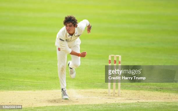 Tom Price of Gloucestershire bowls during the Friendly match between Gloucestershire and Somerset at the Country Ground Bristol on July 29, 2020 in...