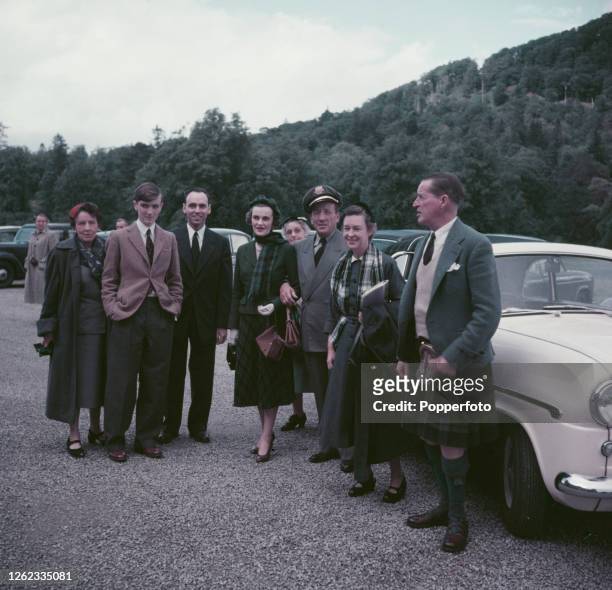 Ian Campbell, 11th Duke of Argyll posed on right with Margaret Campbell, Duchess of Argyll , 4th from left, as they greet guests invited to a...