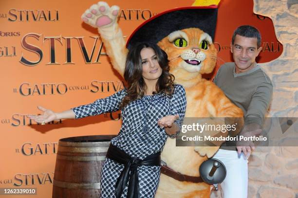 The actors Antonio Banderas and Salma Hayek participate in the photocall of the animated film The Puss in Boots at the Hassler Hotel. Rome , November...