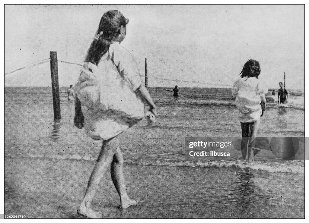 Antique black and white photo: People on Coney Island