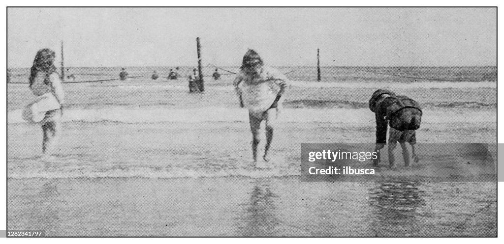 Antique black and white photo: People on Coney Island