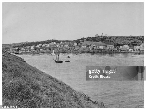 antique black and white photo: monhegan island, maine - monhegan island stock illustrations