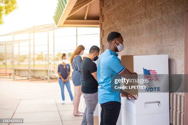 voting - voting mask stock pictures, royalty-free photos & images