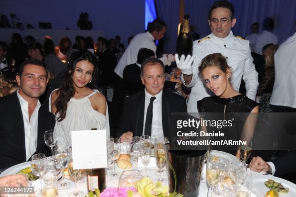 Madalina Ghenea, Fendi CEO Michael Burke and model Anja Rubik attend ...