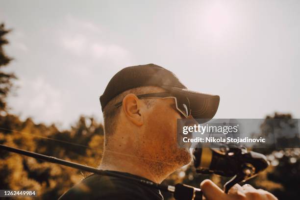 fishing on the river - wading boots stock pictures, royalty-free photos & images