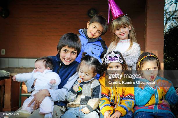 seven kids on birthday smiling - boy tiara stock pictures, royalty-free photos & images