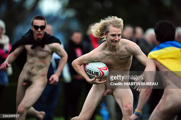 Player of the Nude Blacks is tries to avoid the Romanian Vampires, on September 24 at Larnach castle in Dunedin, during the New Zealand 2011 Rugby...