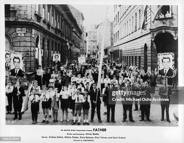 All of Budapest salutes Miklos Gabor on May Day in Tako's fantasy in a scene from the film 'Father', 1966.