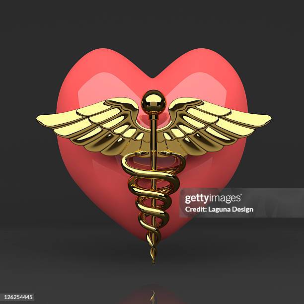 heart symbol with medical symbol (caduceus) - gold caduceus stock-grafiken, -clipart, -cartoons und -symbole