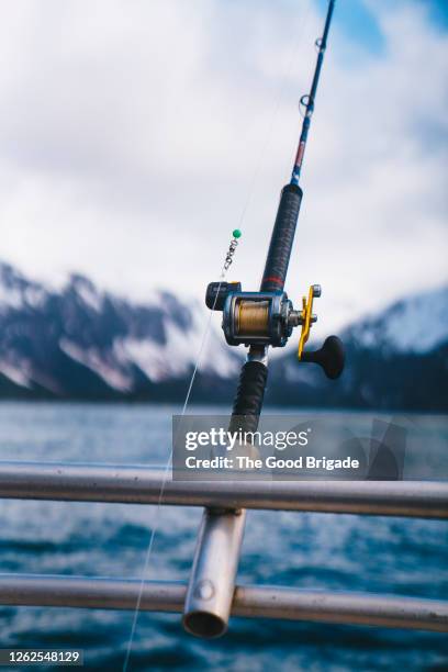 fishing rod on fishing boat - deep sea fishing stock pictures, royalty-free photos & images