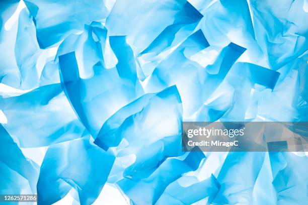 blue plastic bags - plastic bags stock pictures, royalty-free photos & images