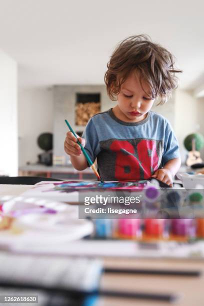 three years little boy doing painting - 2 3 years stock pictures, royalty-free photos & images