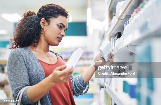 navigating the minefield of medication - medicine label stock pictures, royalty-free photos & images