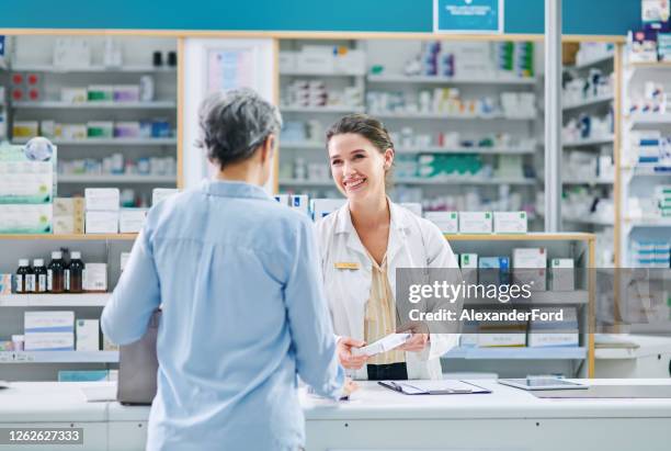 keeping you well is what i do - happy senior medication stock pictures, royalty-free photos & images