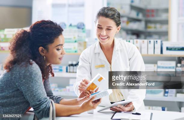 it's a customer favourite - pharmacy customer stock pictures, royalty-free photos & images