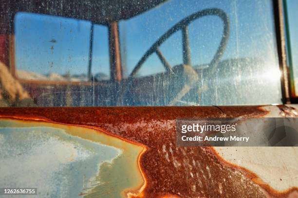old, rusty abandoned truck, mining vehicle in desert, white cliffs, australia - country town australia stock pictures, royalty-free photos & images