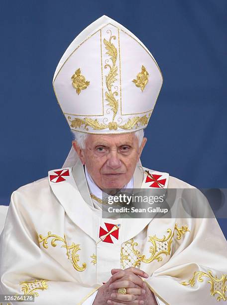 Pope Benedict XVI arrives to lead morning mass at Domplatz square in front of the Erfurter Dom cathedral on September 24, 2011 in Erfurt, Germany....