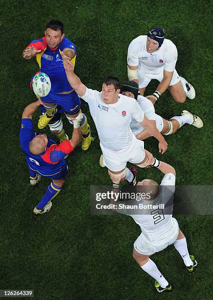 Louis Deacon of England out jumps Cristian Constantin Petre of Romania during the IRB 2011 Rugby World Cup Pool B match between England and Romania...