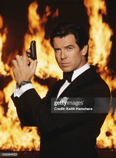 Irish actor Pierce Brosnan stars as James Bond in the film 'GoldenEye', 1995. He is holding his iconic Walther PPK.