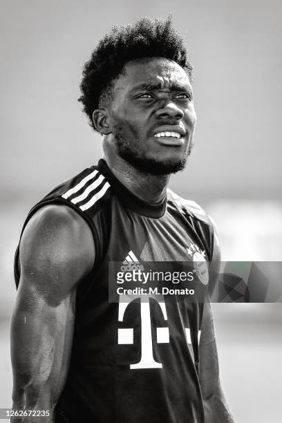 Alphonso Davies of FC Bayern Muenchen looks up during a training session at Saebener Strasse training ground on July 30, 2020 in Munich, Germany.
