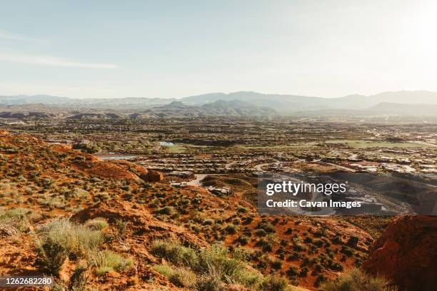 desert landscape surrounding the suburbs of st. george utah - st george utah stock pictures, royalty-free photos & images