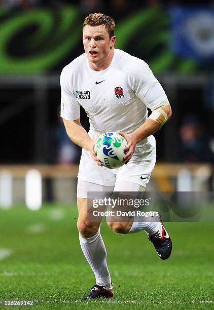 Chris Ashton of England runs with the ball during the IRB 2011 Rugby World Cup Pool B match between England and Romania at Otago Stadium on September...