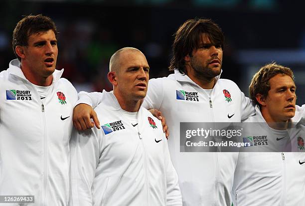 Tom Wood, Mike Tindall, Tom Palmer and Jonny Wilkinson of England sing the national anthem before the IRB 2011 Rugby World Cup Pool B match between...