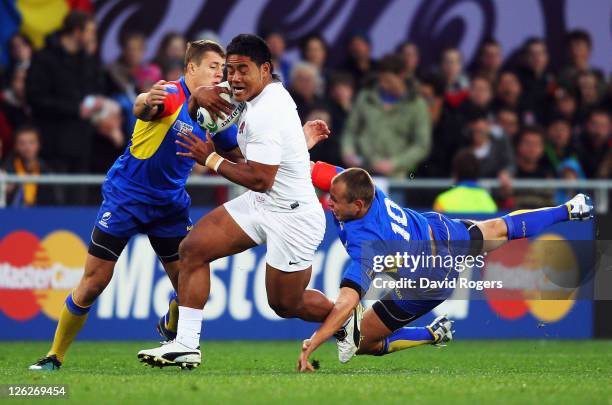 Manu Tuilagi of England breaks with the ball during the IRB 2011 Rugby World Cup Pool B match between England and Romania at Otago Stadium on...